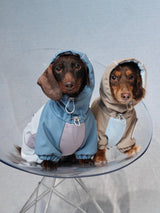 Product photo: Hardshell Stormguard — Waterproof Fleece-Lined Dog Rain Suit.