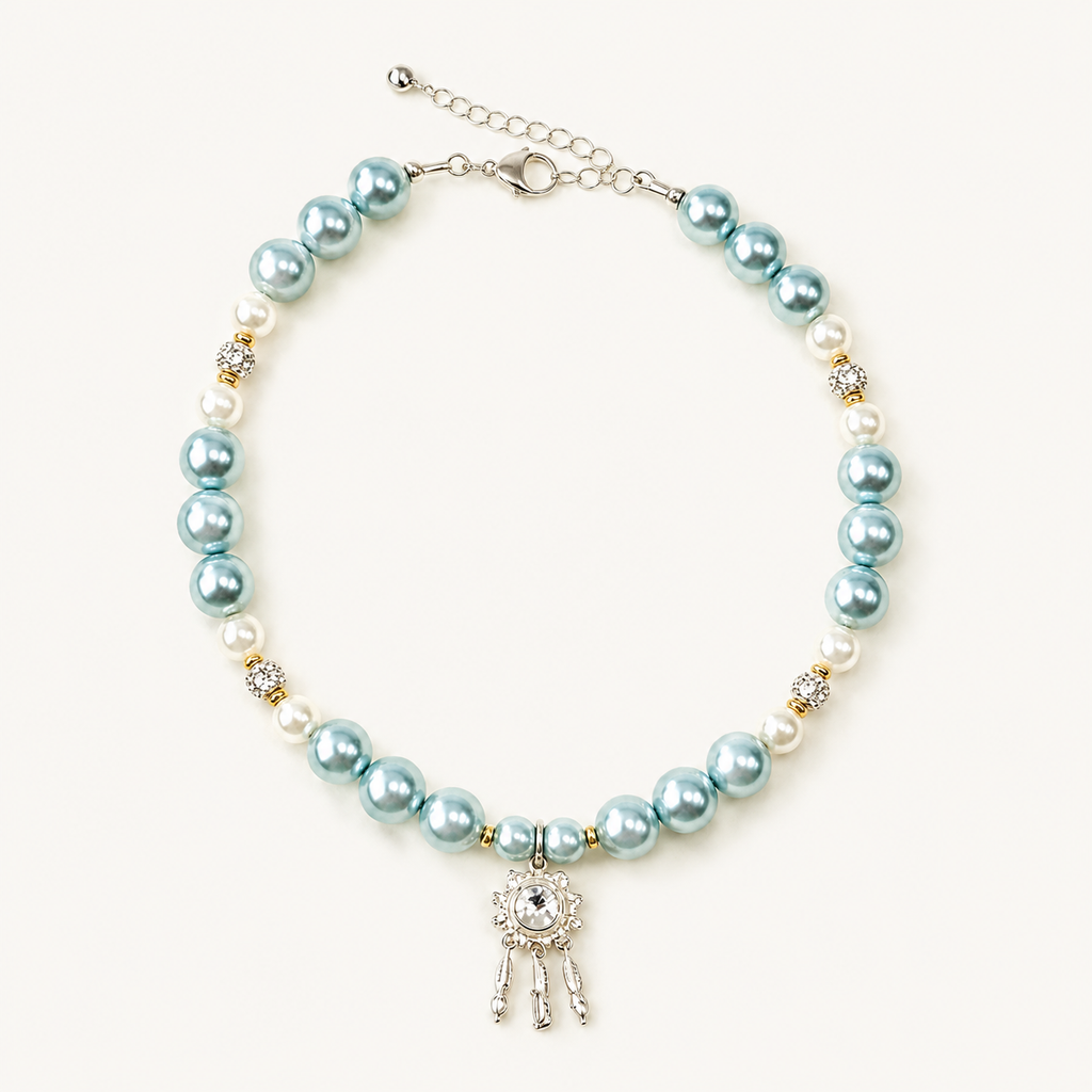 Aqua pearl-effect pet necklace with white accent beads and a silver-tone dreamcatcher pendant.