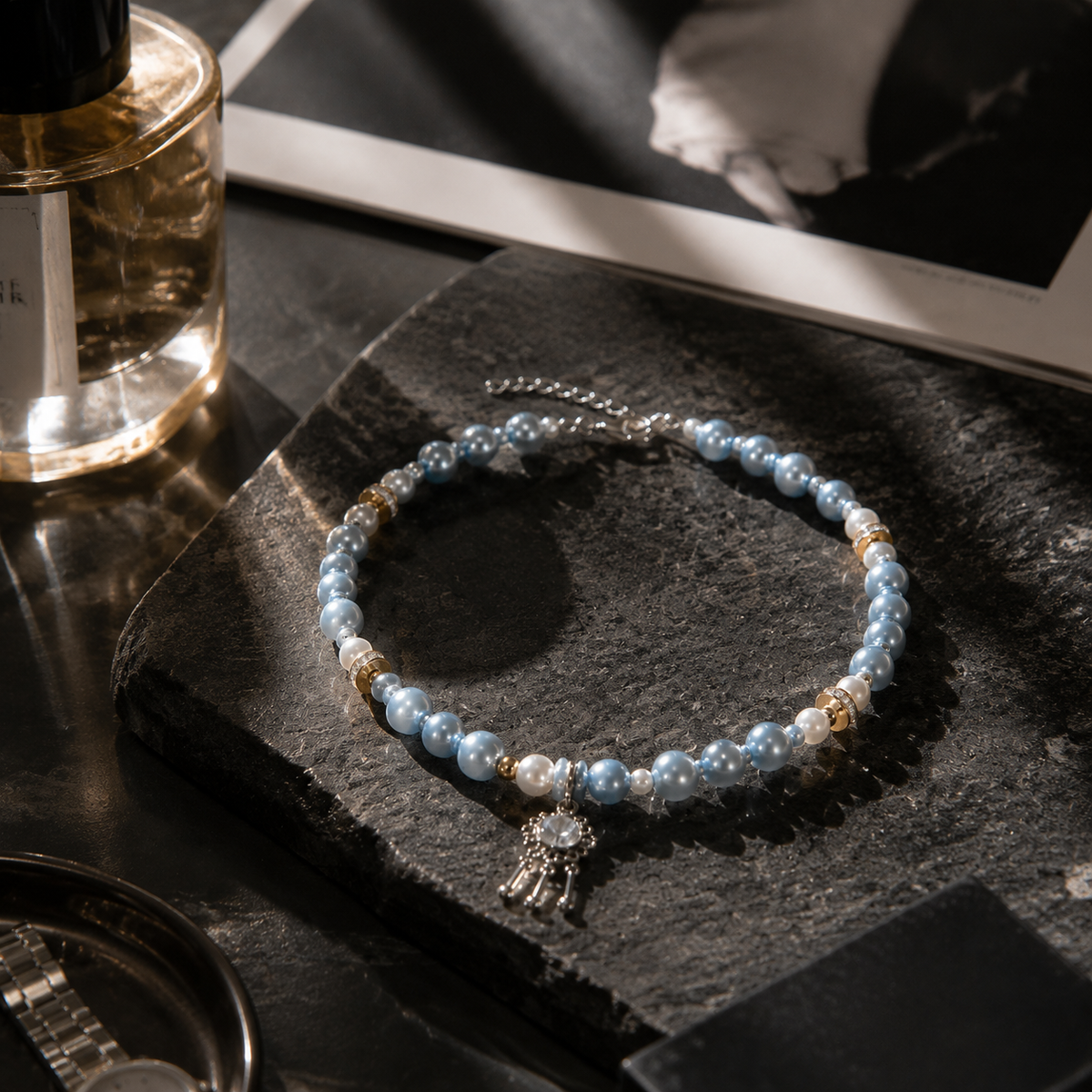 Elegant blue dog necklace with pearl-effect beads, adjustable chain and celestial star pendant