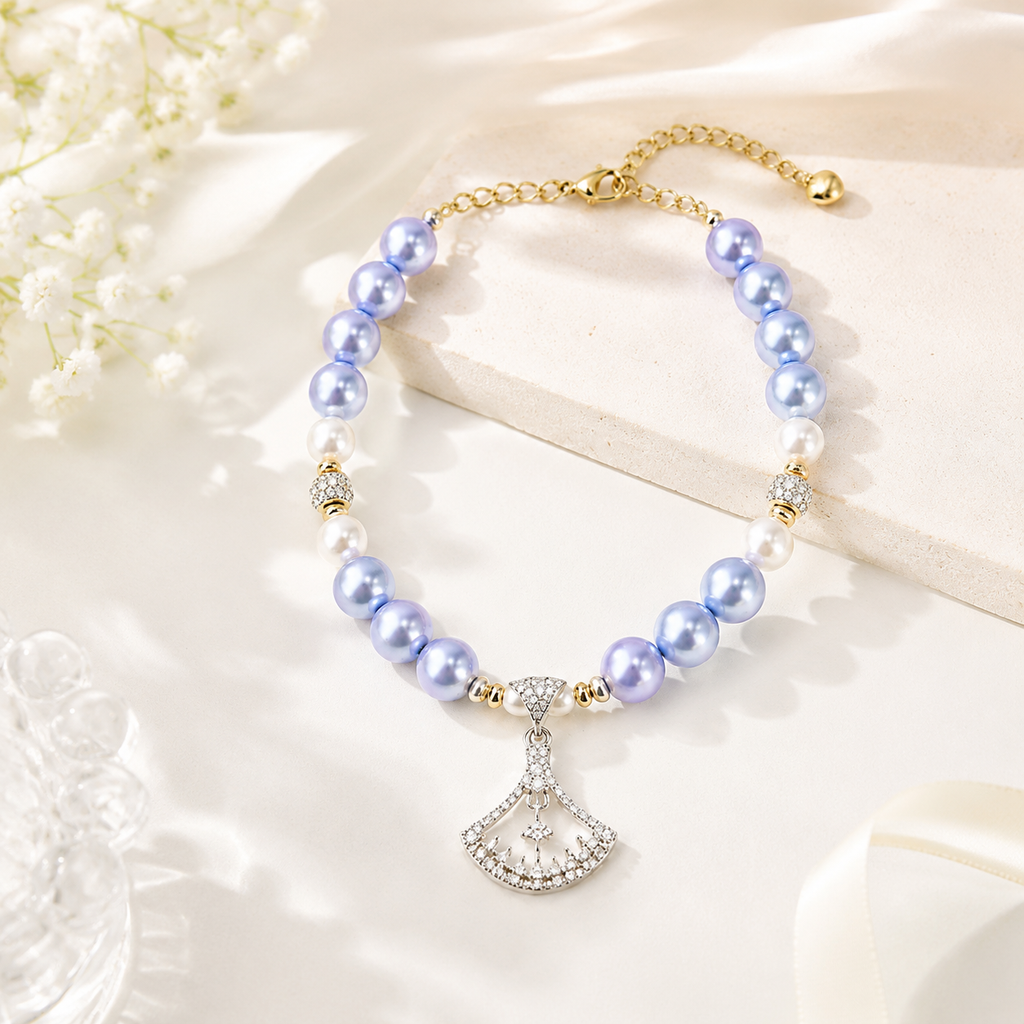 Elegant lavender dog necklace with pearl-effect beads, gold-tone details and adjustable chain