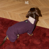Rear view of a plum dachshund bodysuit with a pale pink collar.