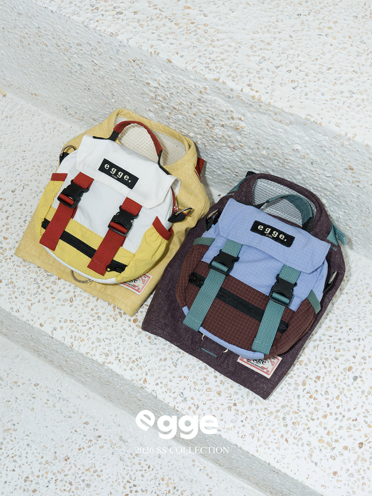 Yellow and blue colorblock dog backpacks with adjustable straps and ropes.