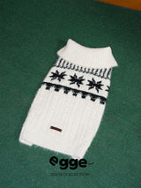 Egge white Fair Isle dog sweater with a ribbed collar and black snowflake pattern.