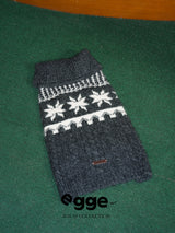 Egge charcoal Fair Isle dog sweater with a ribbed collar and white snowflake pattern.