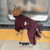 Side view of a burgundy dog puffer suit with back snap fastenings.