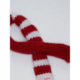 Close-up of the red and cream striped knit scarf.