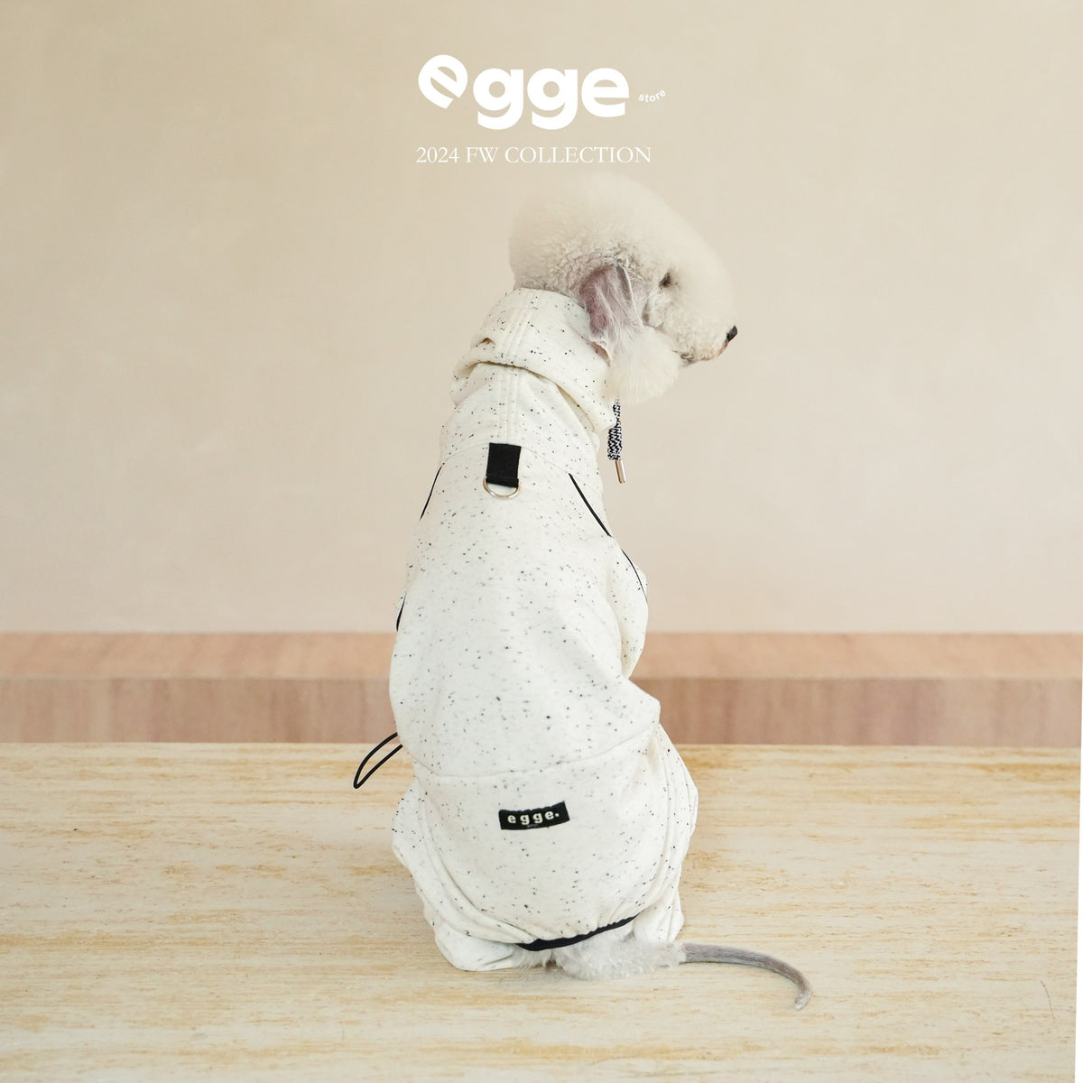 Rear view of a cream dog fleece bodysuit.