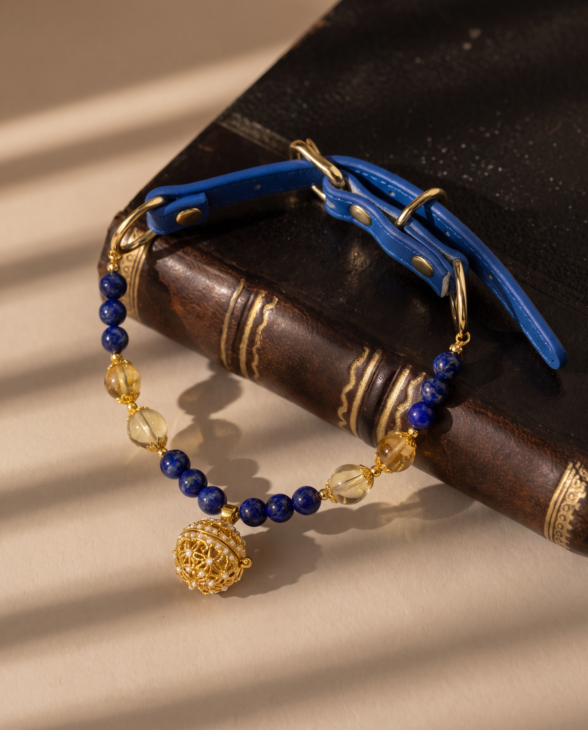 Lapis & Citrine dog collar with natural lapis lazuli and citrine beads, blue strap and gold-tone details
