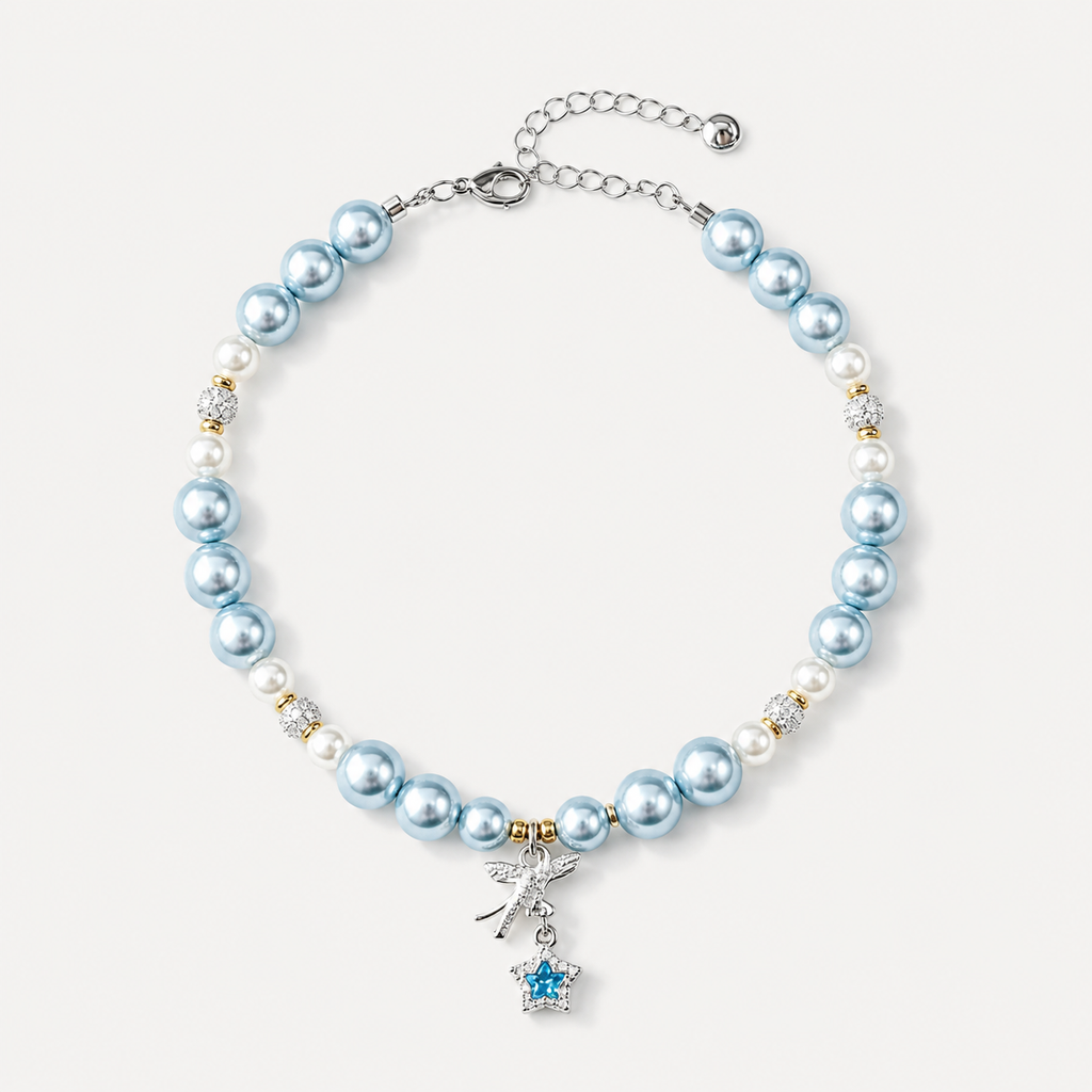 Pale blue pearl-effect pet necklace with white accent beads and a blue star charm.